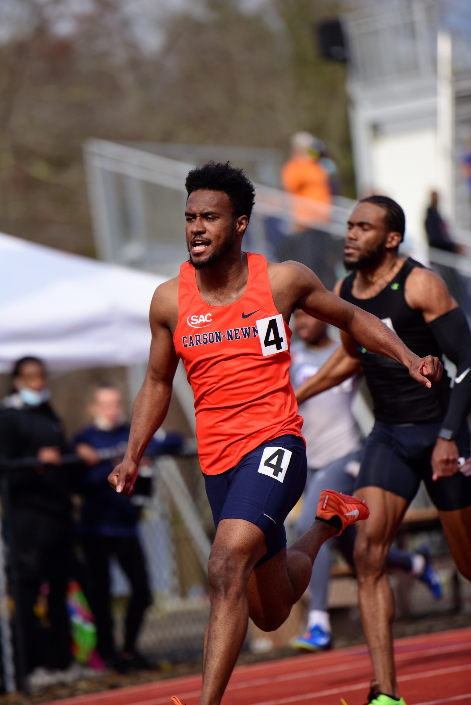 Moore sets national qualifying time on day one of Lee Invitational