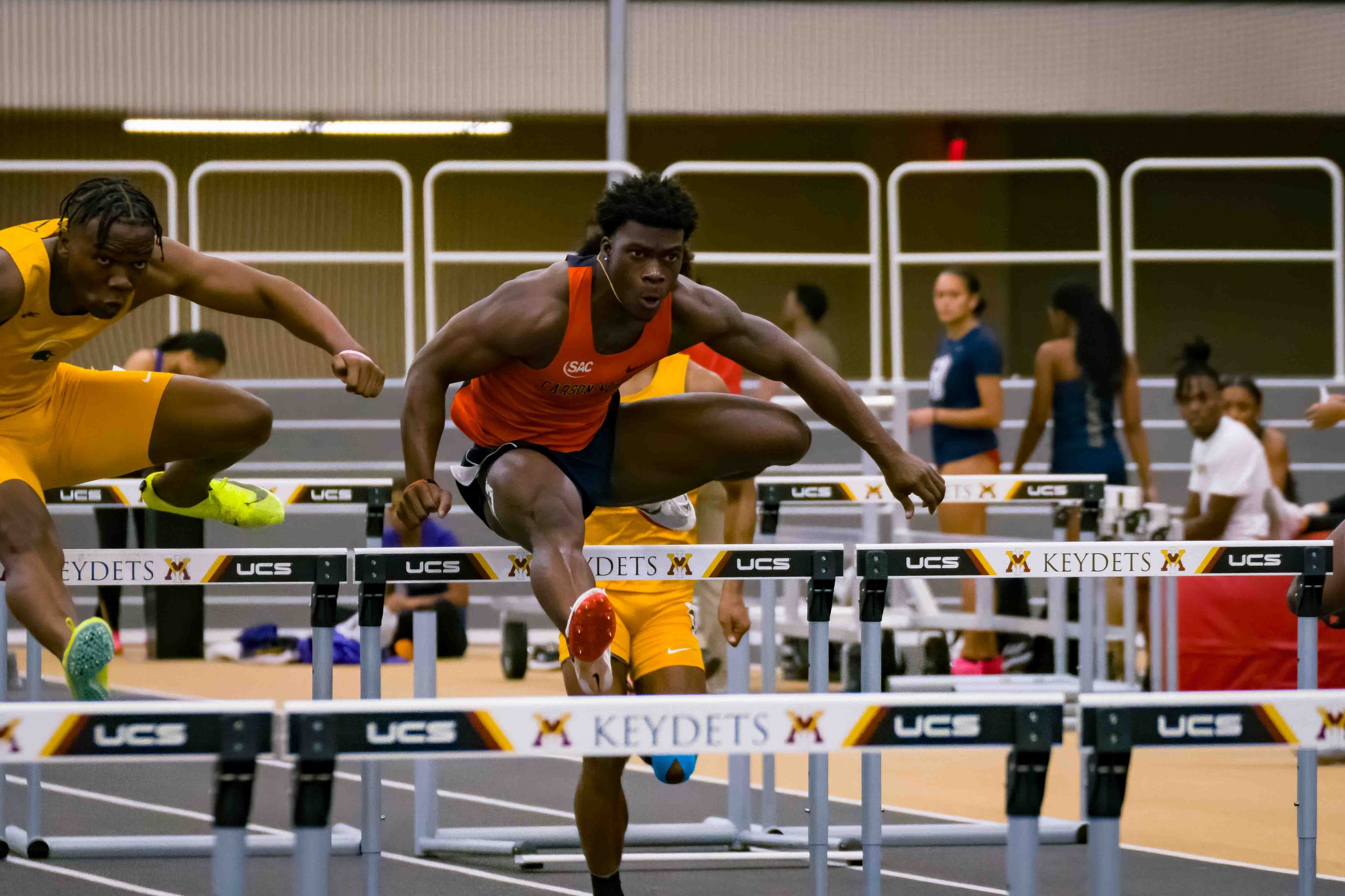 National qualifying marks, top rankings, and gold-medal performances conclude the Trojan Opener