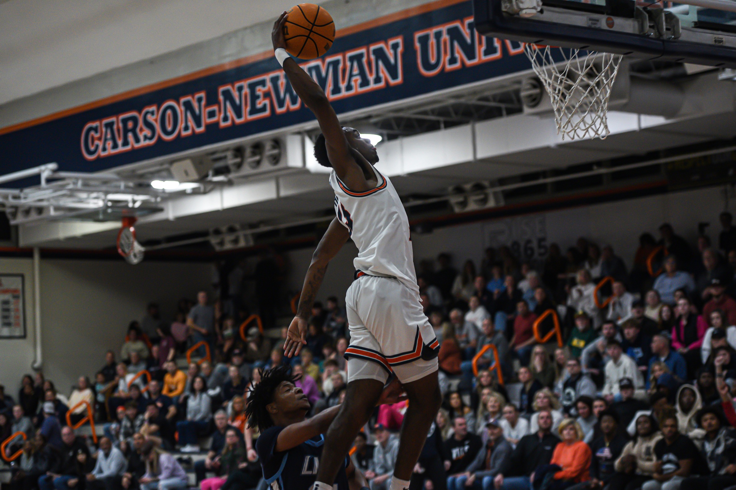 C-N takes heavyweight prize fight from LMU, 91-82