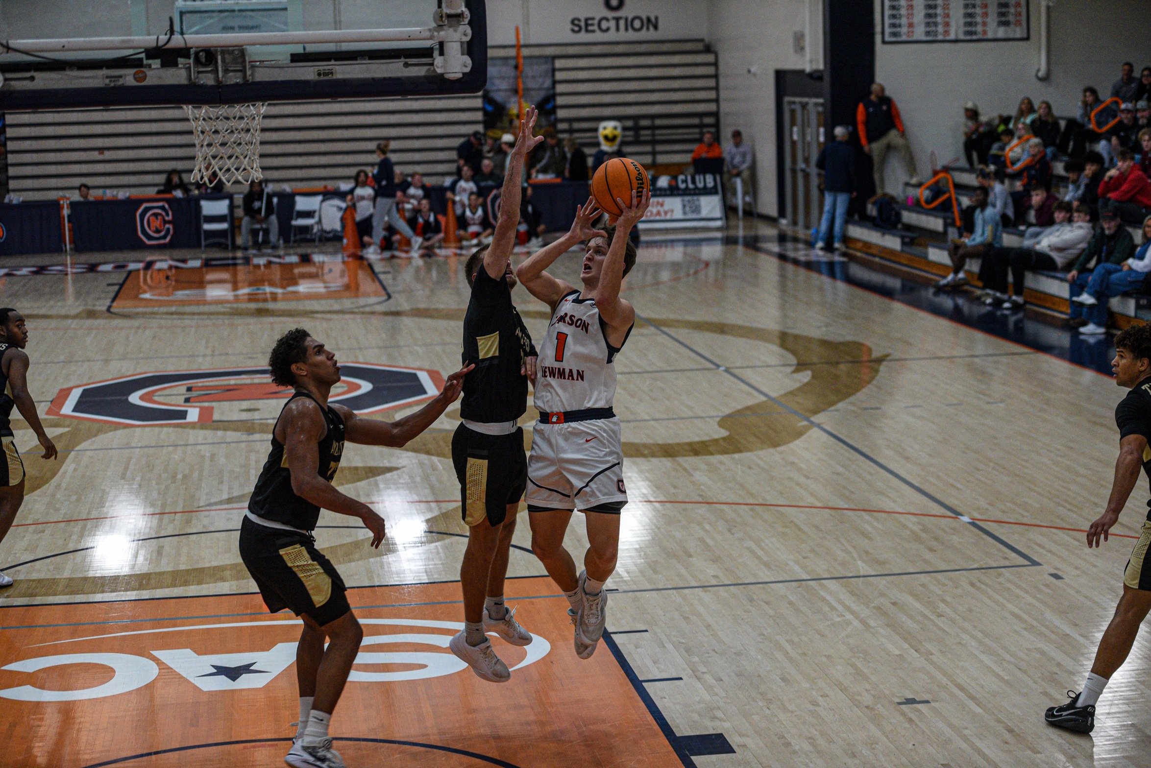 No. 18 Trojans smash glass, stay perfect 94-80 over C-N