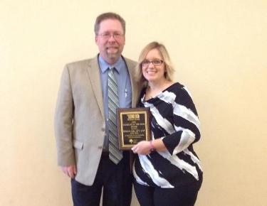 Carson-Newman Director of Sports Medicine Mike Van Bruggen with TATS Backbone Award winner Becky Cate