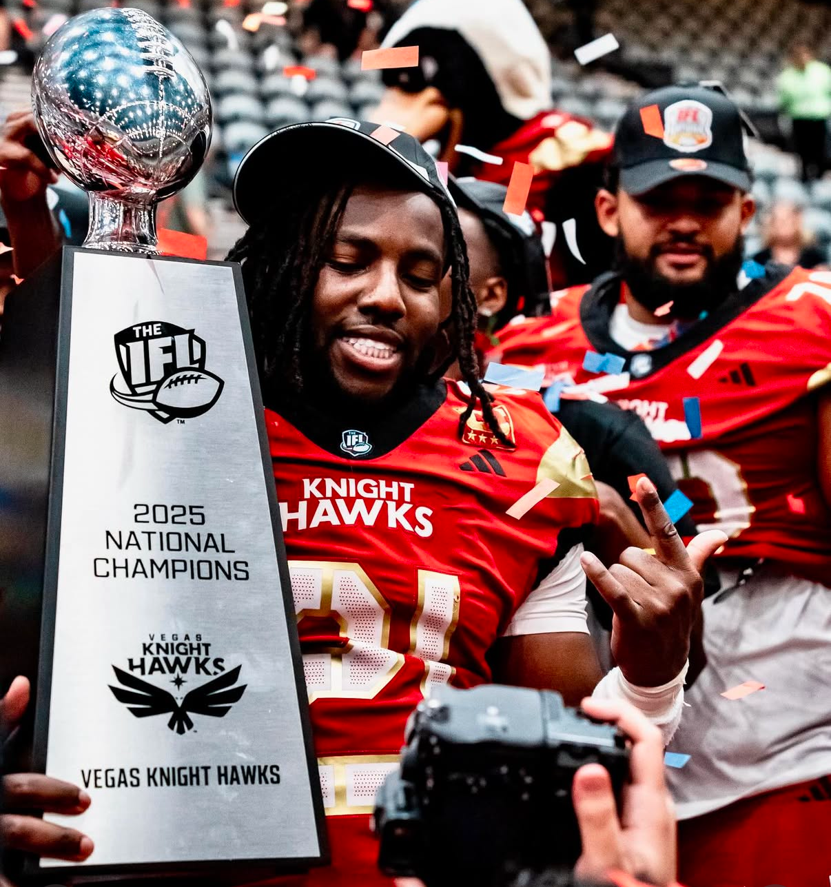 Darius Williams ('20) hoists the IFL National Championship Trophy for the Vegas Knighthawks.