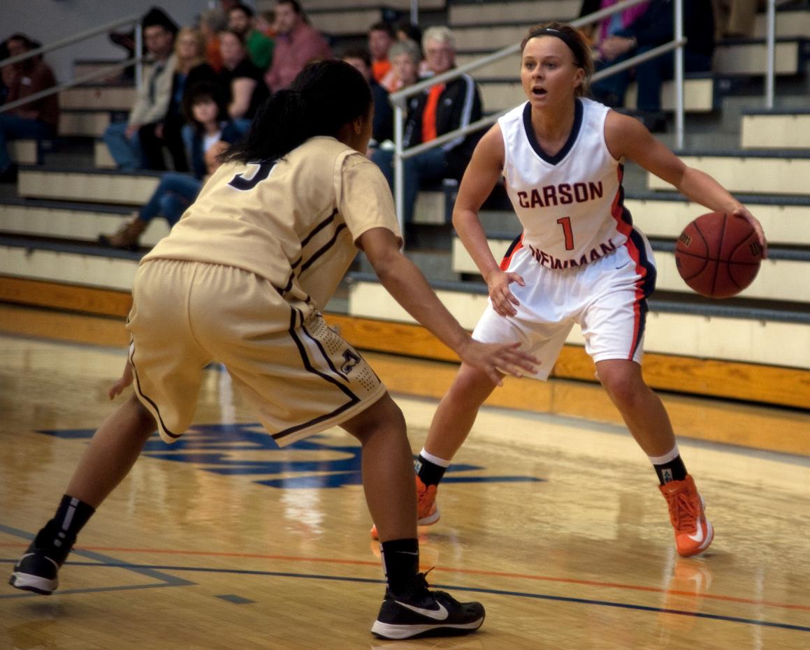 Lady Eagles fall to Trojans 58-51