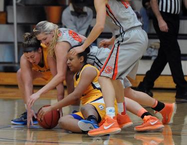 Suffocating first half defense powers Lady Eagles to 76-59 win over Royals