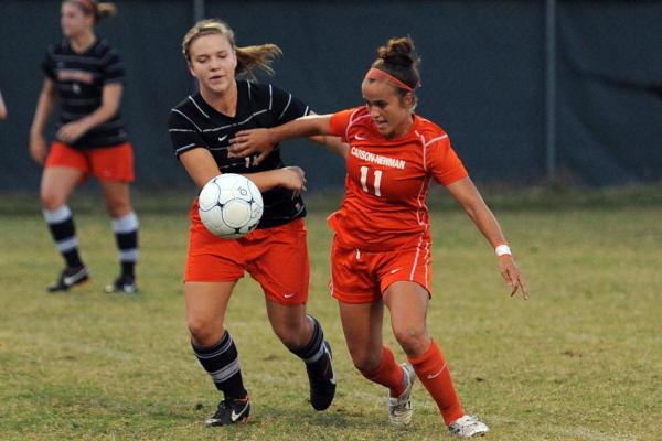 Lady Eagles fight off Milligan, 3-1
