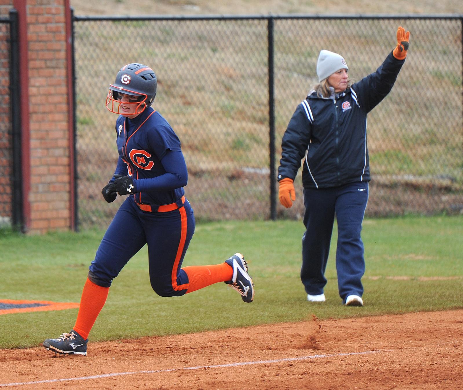 Big bats help Eagles to split in Tigerville