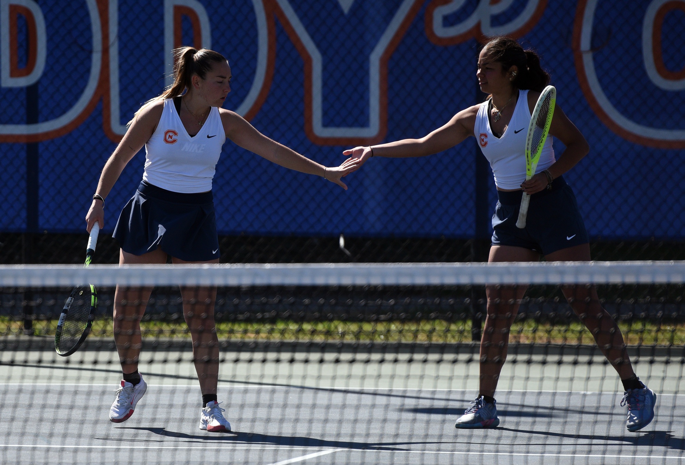 Two wins for women&rsquo;s tennis power them into third day of competition.